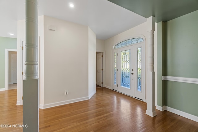 entrance foyer featuring wood-type flooring