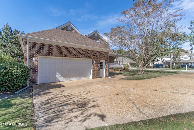 view of home's exterior with a garage