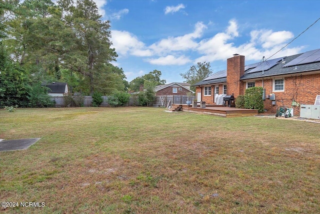 view of yard featuring a deck