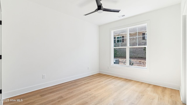 unfurnished room with ceiling fan and light hardwood / wood-style flooring