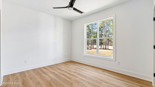 unfurnished room with ceiling fan and light hardwood / wood-style flooring