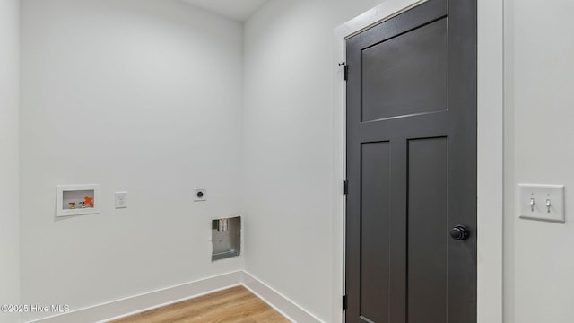 laundry room with washer hookup, hardwood / wood-style flooring, and hookup for an electric dryer