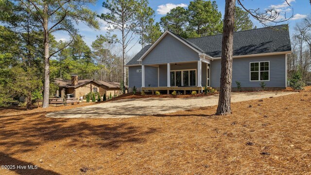 view of front of home featuring ceiling fan