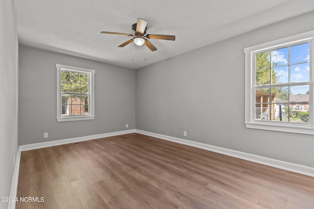 unfurnished room featuring wood-type flooring and ceiling fan