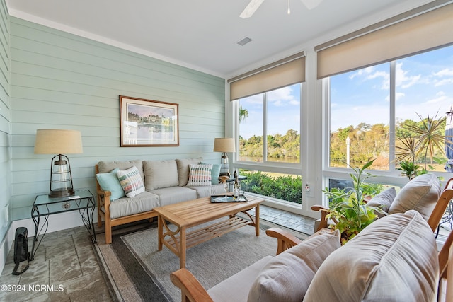 sunroom / solarium with ceiling fan