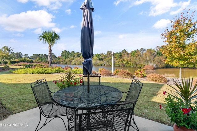 view of patio / terrace featuring a water view