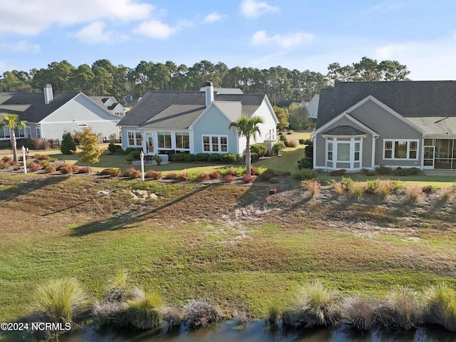 view of front of home with a front yard