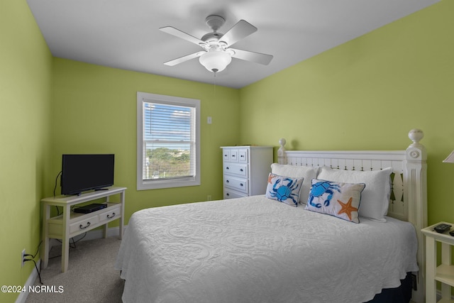 bedroom with ceiling fan and carpet flooring