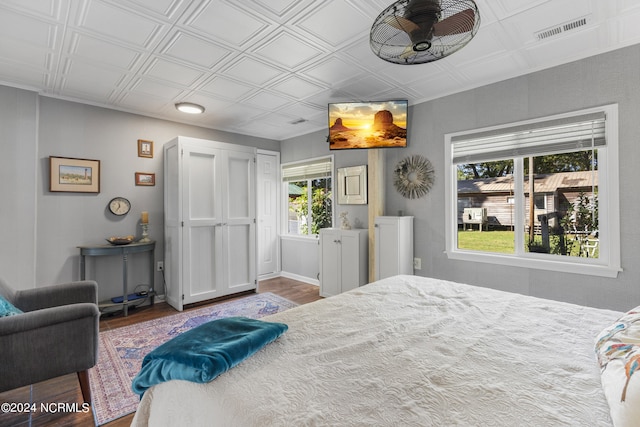 bedroom featuring wood-type flooring