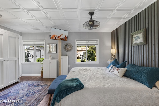 bedroom featuring dark hardwood / wood-style flooring