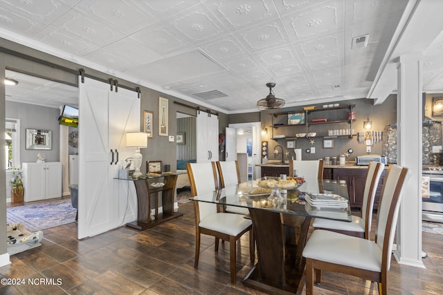 dining space with a barn door