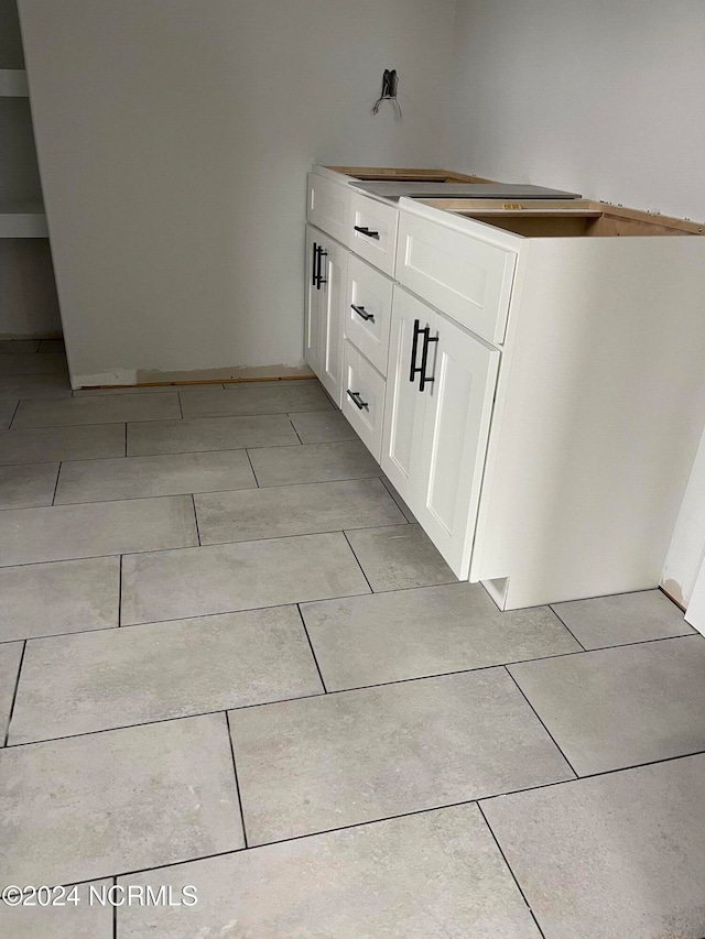 bathroom with tile patterned flooring