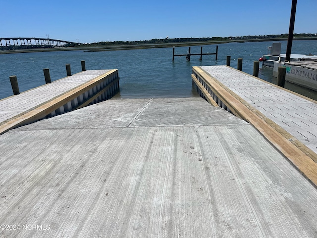 view of dock with a water view