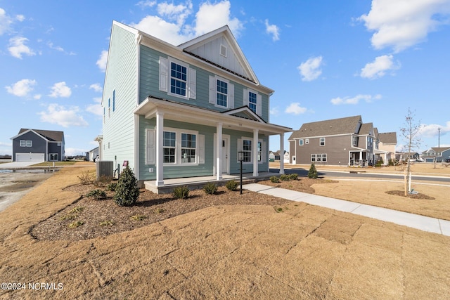 view of front of home featuring cooling unit and covered porch