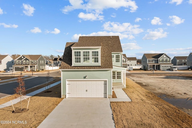 front of property with a garage