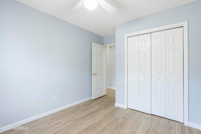 unfurnished bedroom with a closet, ceiling fan, and light wood-type flooring