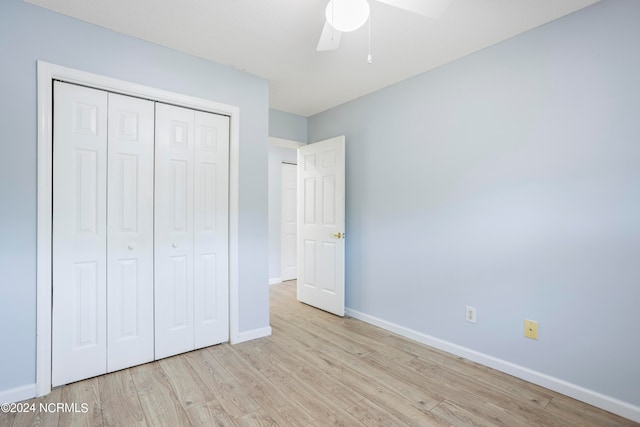 unfurnished bedroom featuring a closet, ceiling fan, and light hardwood / wood-style flooring