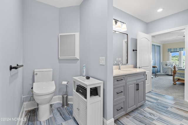 bathroom with vanity and toilet