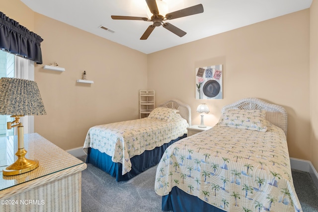 bedroom featuring ceiling fan and carpet floors