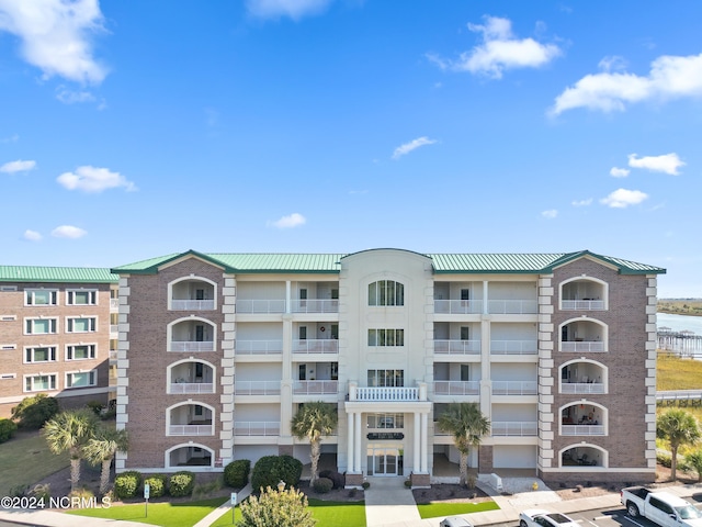 view of building exterior featuring a water view