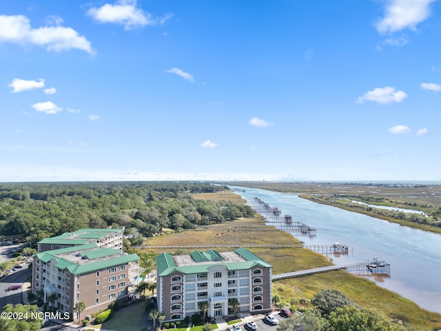 bird's eye view with a water view