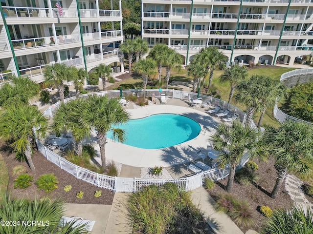 view of pool featuring a patio