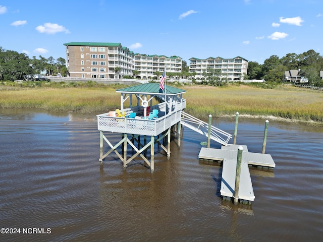 dock area featuring a water view