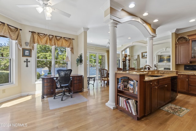 kitchen with ceiling fan, a healthy amount of sunlight, and light hardwood / wood-style floors