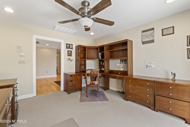 office area with light carpet and ceiling fan