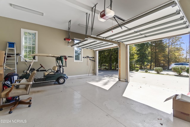 garage featuring a garage door opener