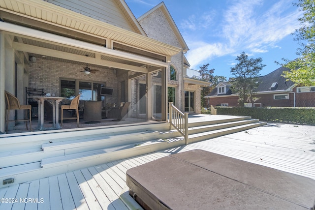 wooden deck with ceiling fan