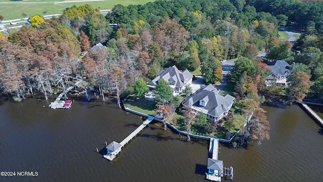 birds eye view of property featuring a water view