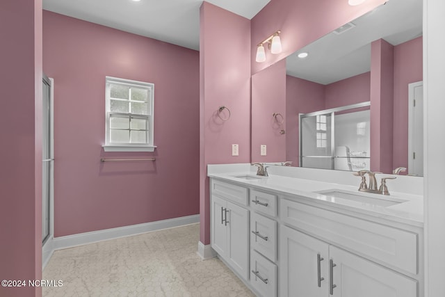 bathroom featuring walk in shower and vanity