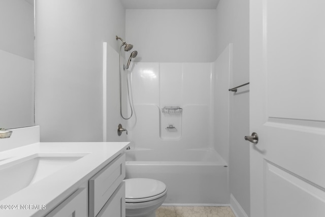 full bathroom with tub / shower combination, vanity, and toilet