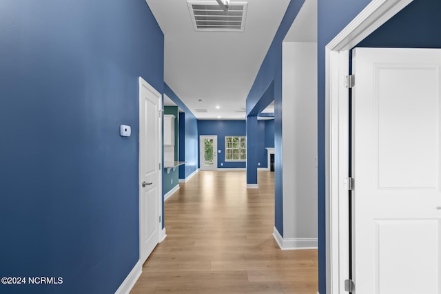 hall featuring light hardwood / wood-style flooring