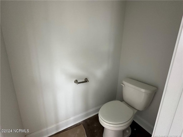 bathroom featuring toilet