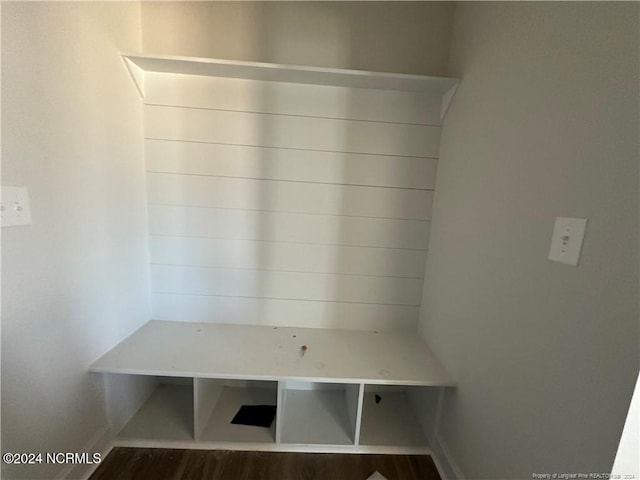 mudroom with dark wood-type flooring