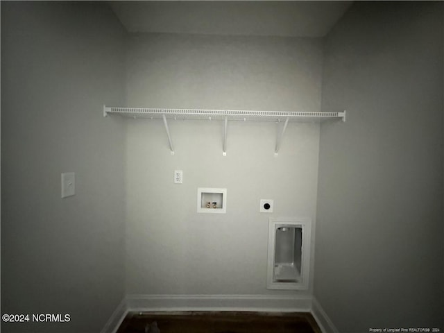 clothes washing area featuring washer hookup and hookup for an electric dryer