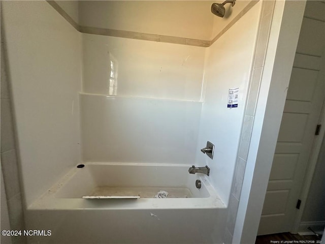 bathroom with shower / bath combination