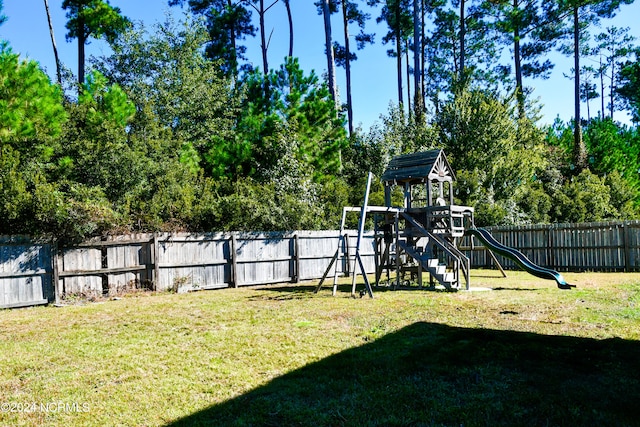 view of yard with a playground