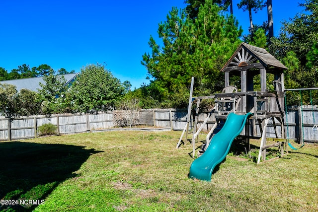 view of play area with a yard