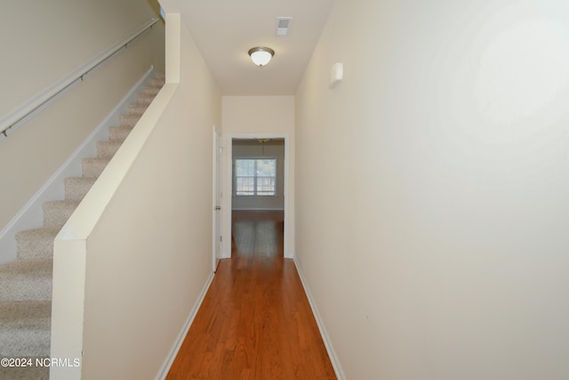 hallway featuring hardwood / wood-style flooring