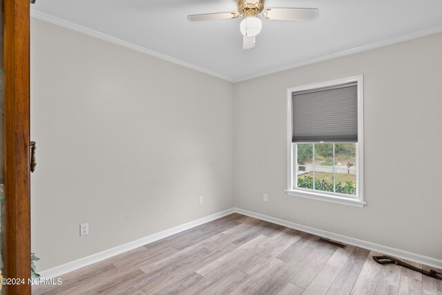 bedroom featuring light hardwood / wood-style floors and ornamental molding