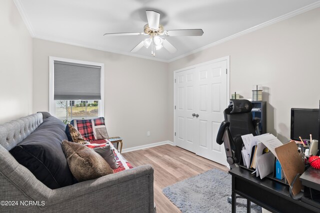 bedroom with ornamental molding and light hardwood / wood-style flooring