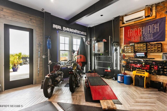 garage featuring a garage door opener and a wall mounted air conditioner