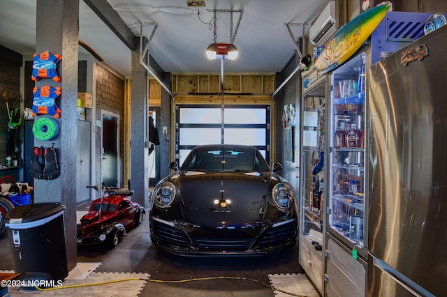 garage with a garage door opener and a wall mounted AC