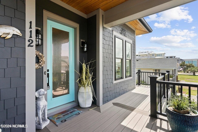 wooden deck with ceiling fan