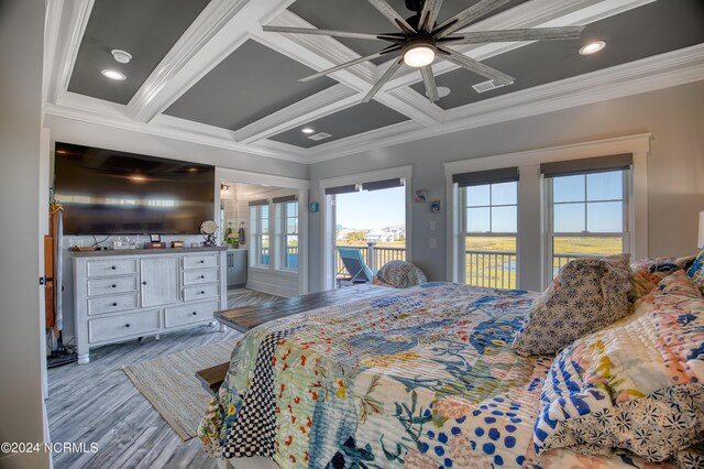 bedroom with light hardwood / wood-style floors, ceiling fan, beam ceiling, crown molding, and coffered ceiling