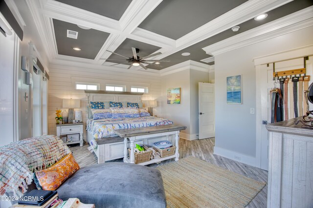 doorway to outside featuring a wealth of natural light, wood-type flooring, and crown molding