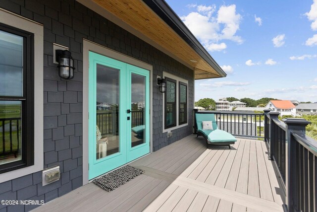 wooden deck with french doors